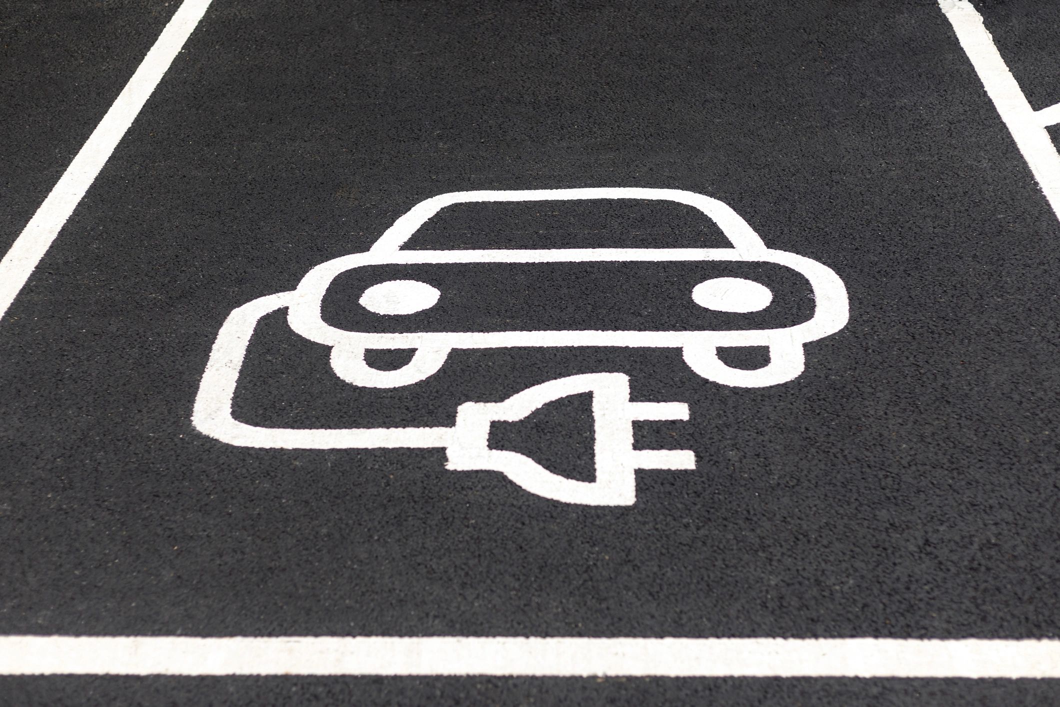 Electric vehicle charging symbol representing sustainable transport